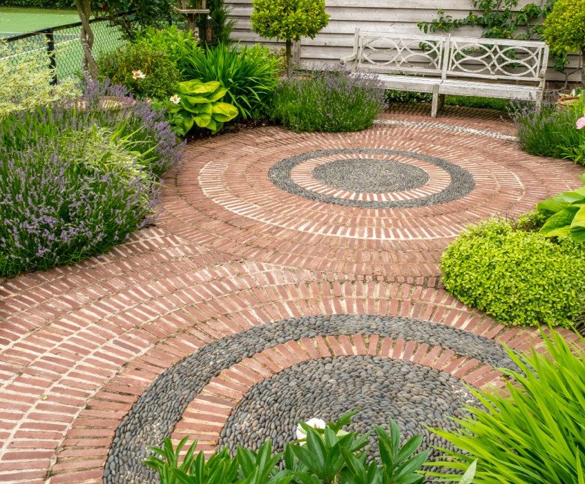 Bespoke circular brickwork on a garden patio.